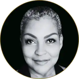 Professional woman portrait emphasizing leadership and confidence in a corporate setting.